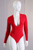 A DEEP V DOUBLE LAYER SNAP BUTTON BODYSUIT